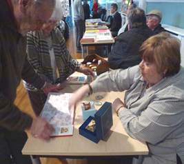 A keen interest being shown in one of our members tables