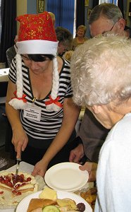 Megan Slicing a Cake