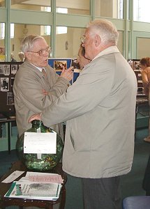 Tom Larkin makes a point to Bill Pope