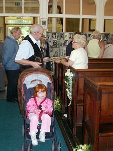 Reg Aston finds time to look after a young visitor