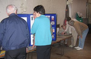 more visitors look at the boards 