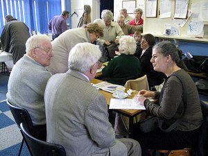 The Secretary and the Treasurer sign people in