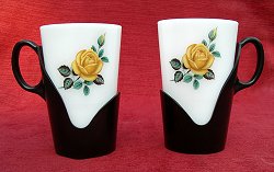 Mugs in Plastic Holders