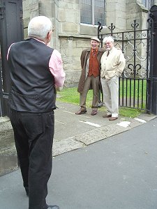 Reg duly takes a photograph to record the visit